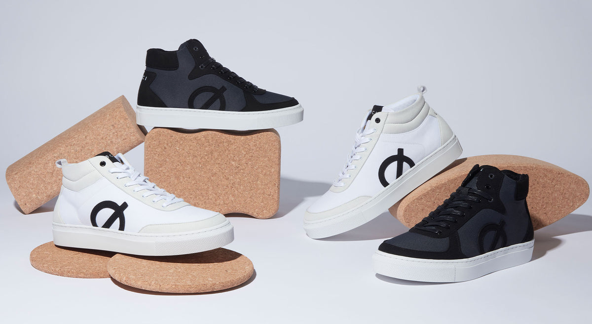 Man Wearing LOCI White Vegan Sneakers 