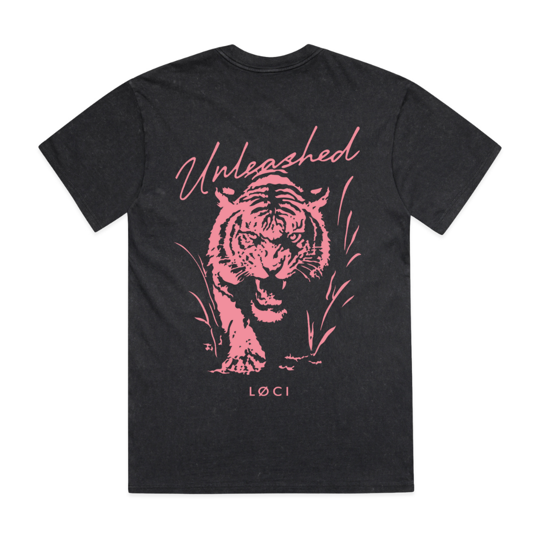 Black t-shirt with pink tiger graphic and 'Unleashed' text on a white background