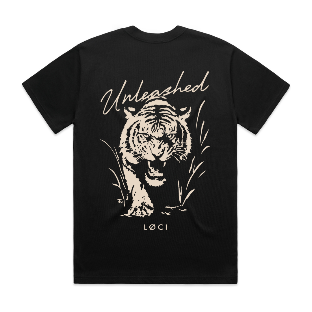 Black t-shirt with a white tiger graphic and 'Unleashed' text on a white background