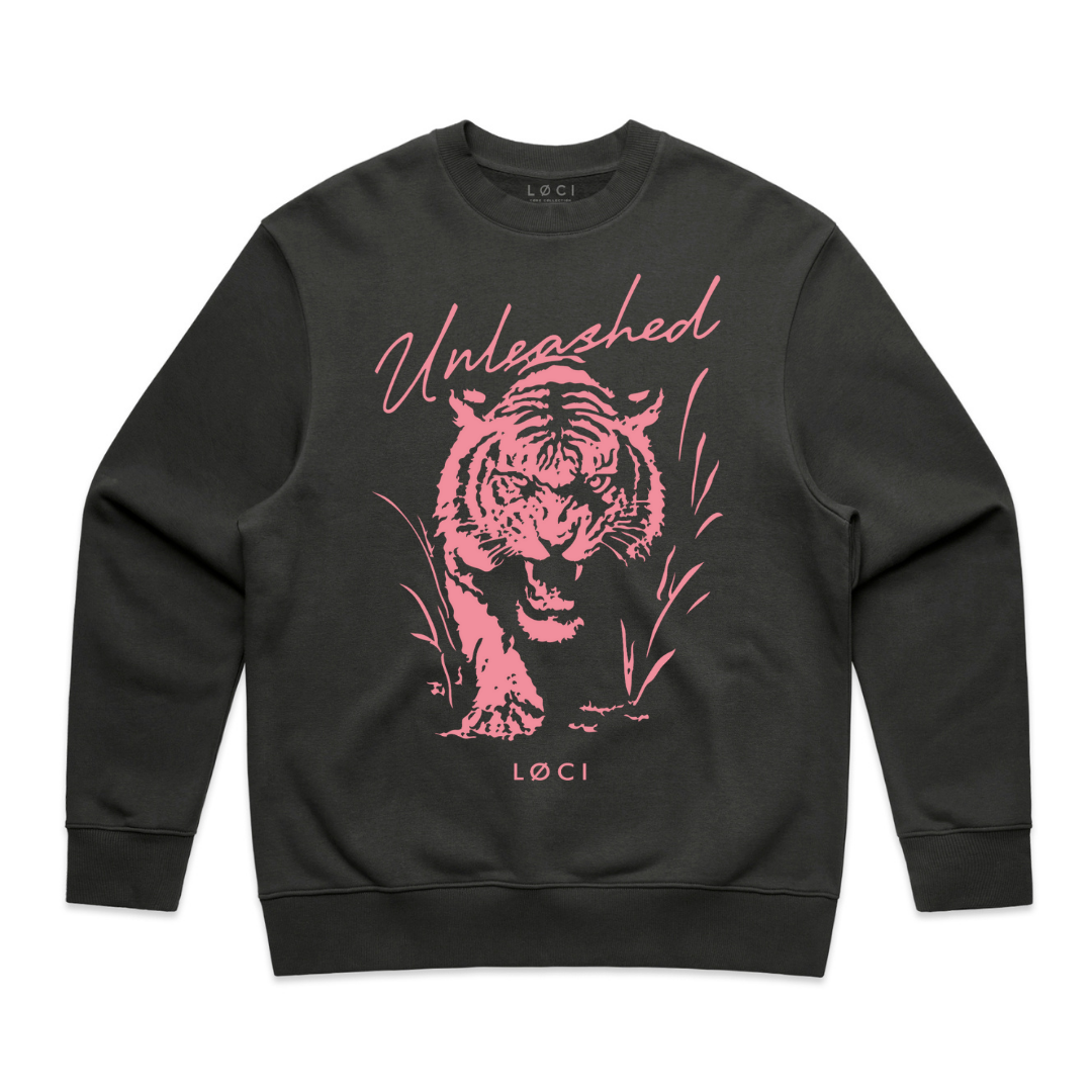 Black sweatshirt with pink tiger graphic and 'Unleashed' text on a white background